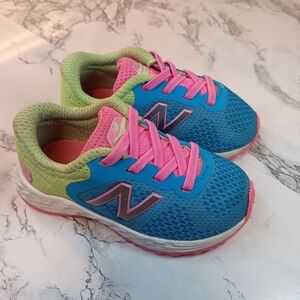 Size 5C New Balance Kids' Blue and Pink Sneakers